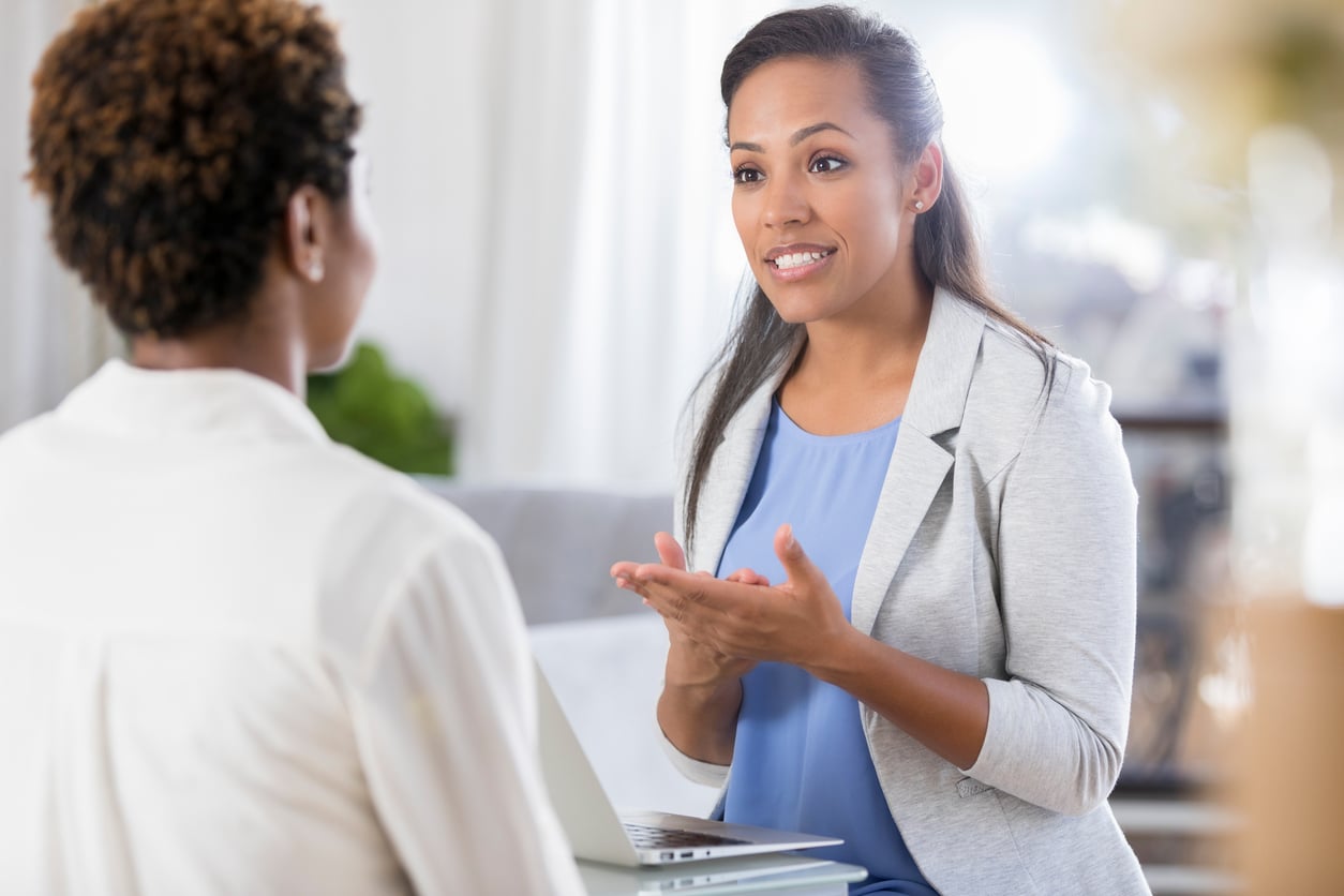 Caring counselor advises female client