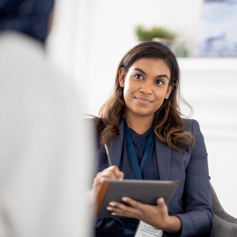 A woman taking notes