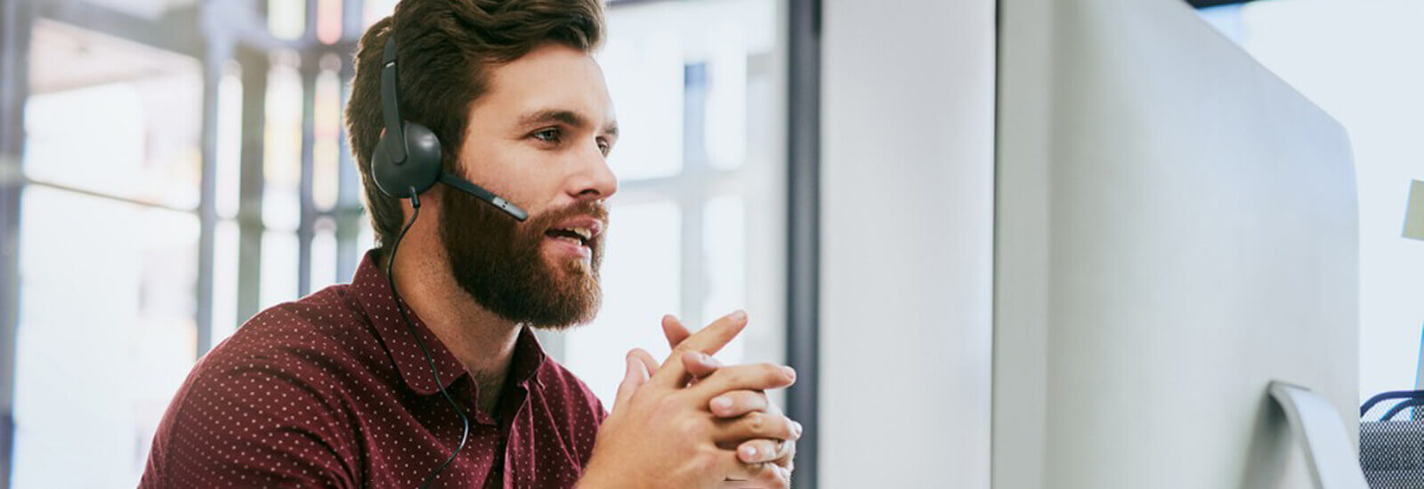 A man in a headset speaking