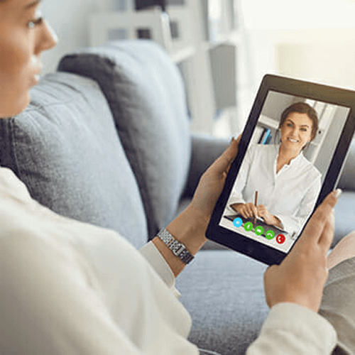 A women on a video call on a tablet