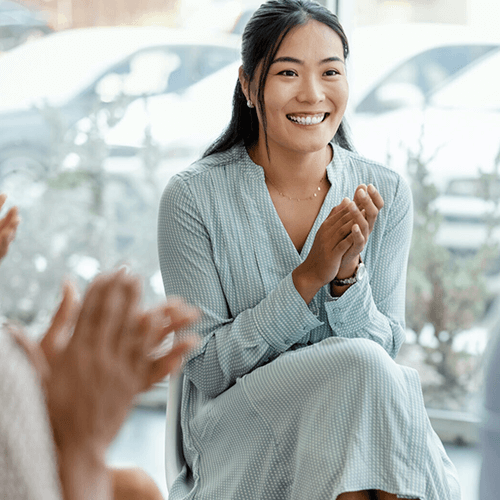 A woman clapping