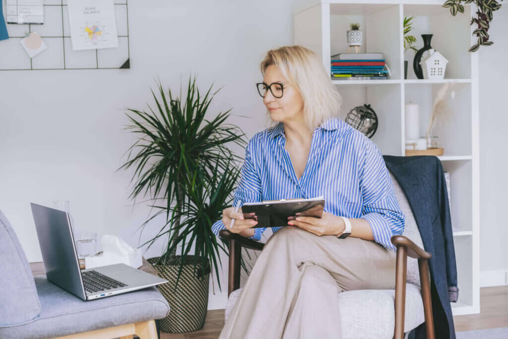 mental health provider watching the best practices for implementing a virtual care webinar